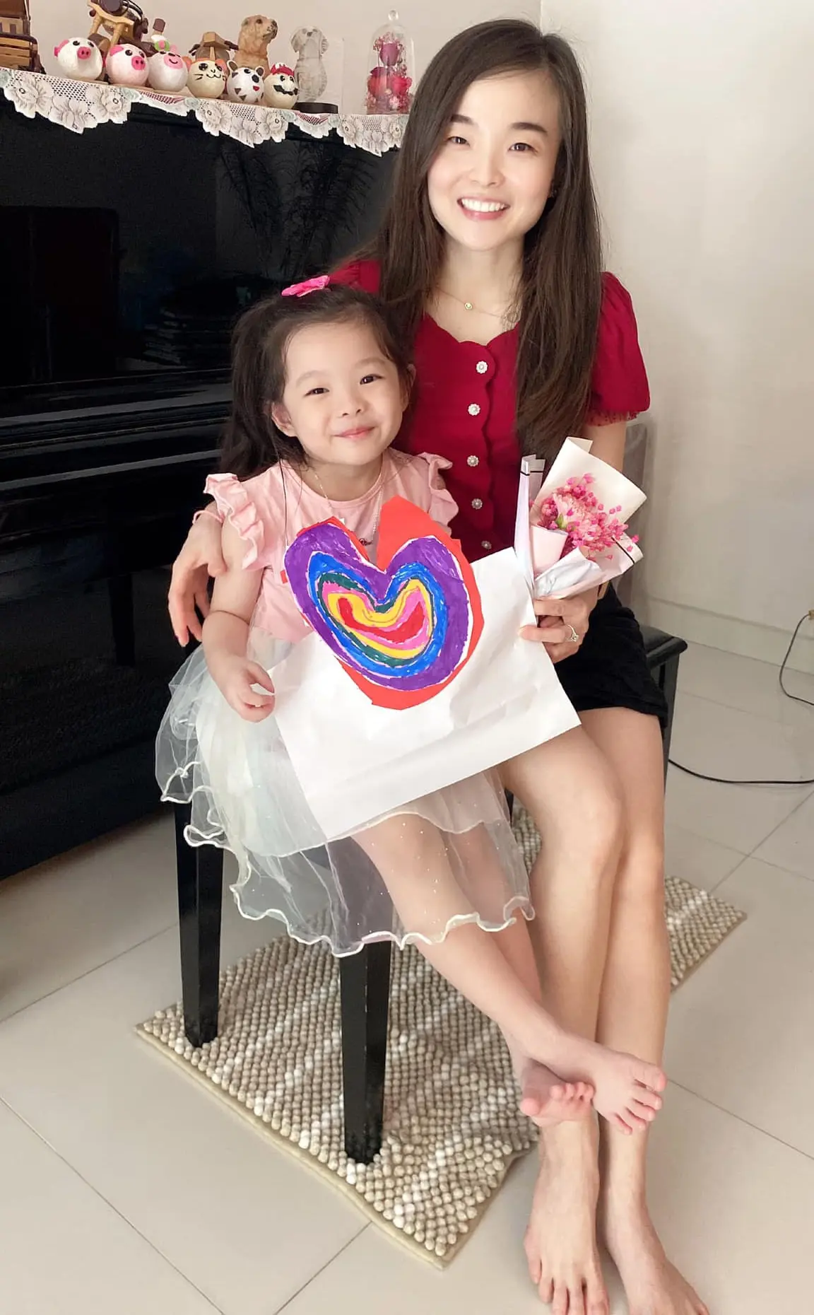 a child and a child sitting on a chair | Top Lead Generation Agency