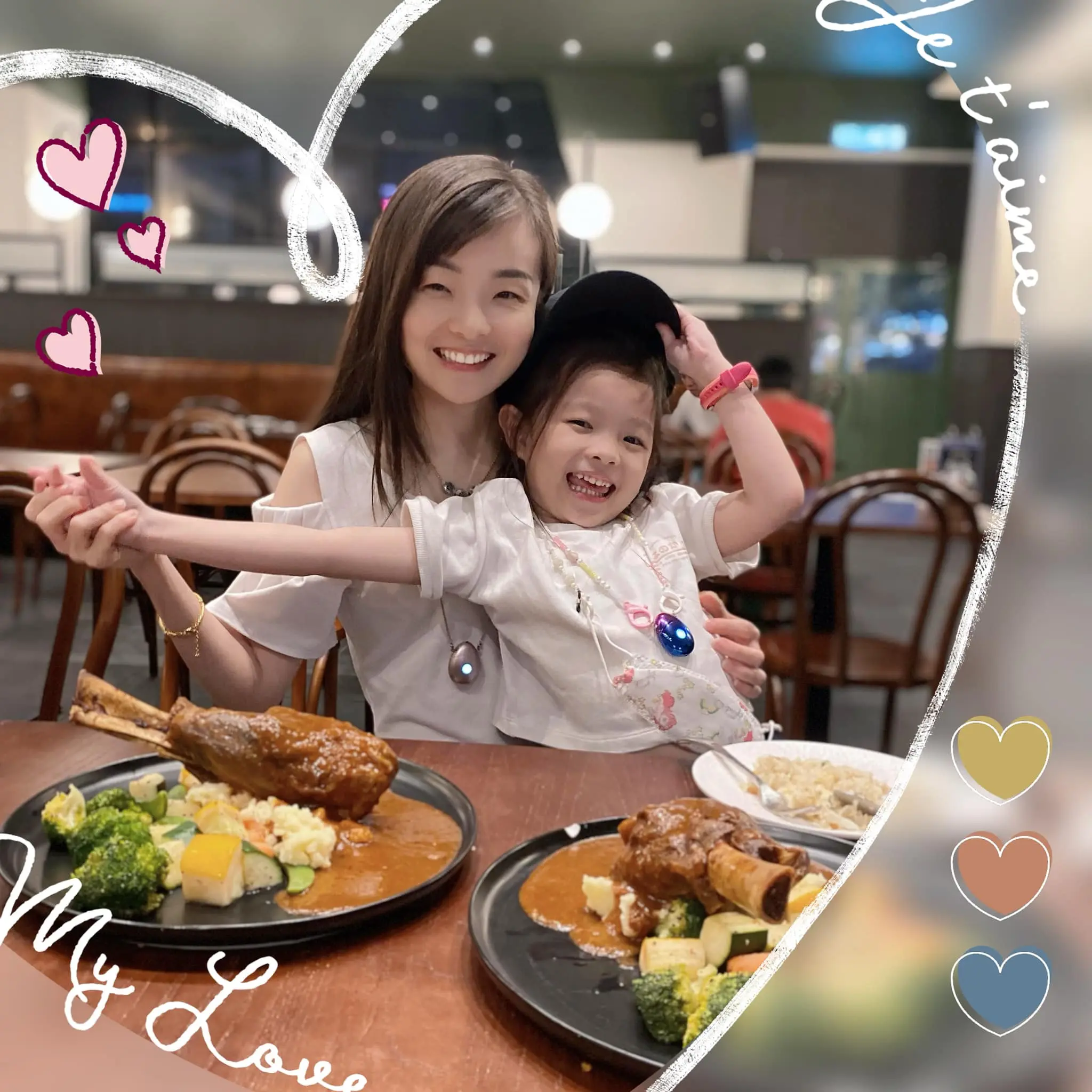 a person and a child sitting at a table with plates of food | Top Lead Generation Agency